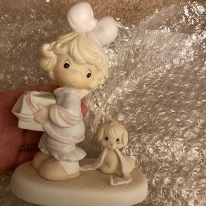 Precious moments “tied up for the holidays”